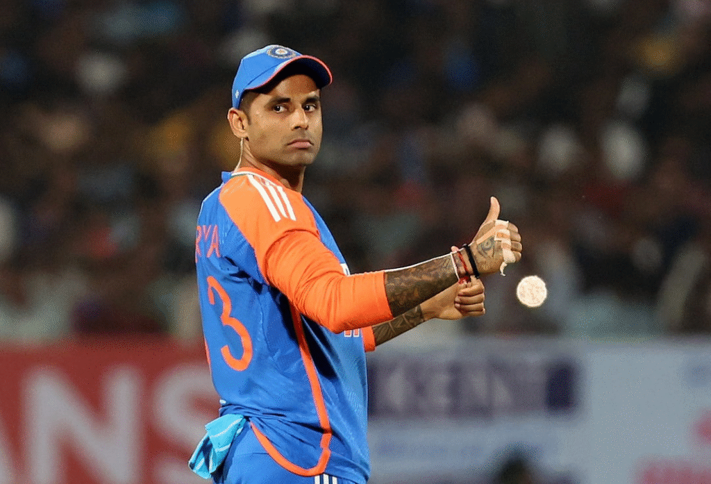 Suryakumar Yadav in India cricket team jersey giving a thumbs-up gesture during a match